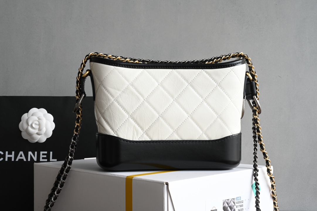 Small Gabrielle Hobo Bag in White and Black Quilted Aged Calfskin with Gold-Tone and Silver-Tone Metal (Model AS0502) - Mocuir