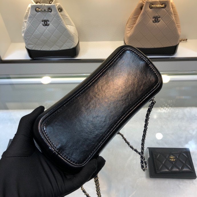 Gabrielle Small Quilted Aged Calfskin Backpack in Navy Blue & Black - Mocuir