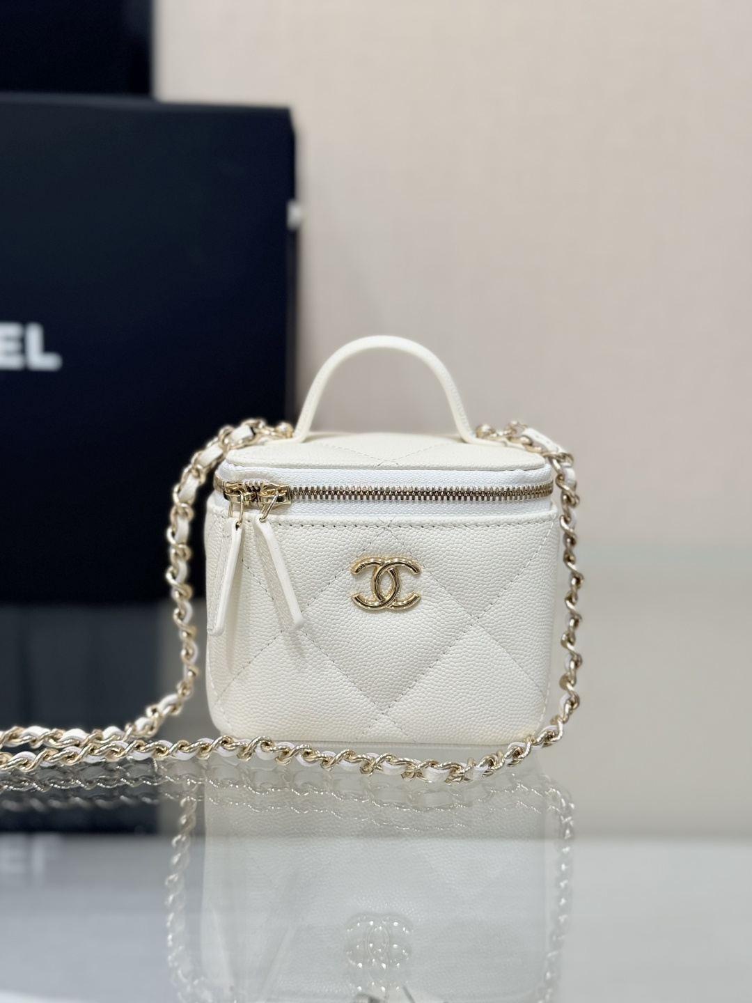 Mini Top Handle Vanity Case (AS5993) in White Quilted Grained Calfskin (Caviar) with Antique Gold-Tone Hardware - Mocuir