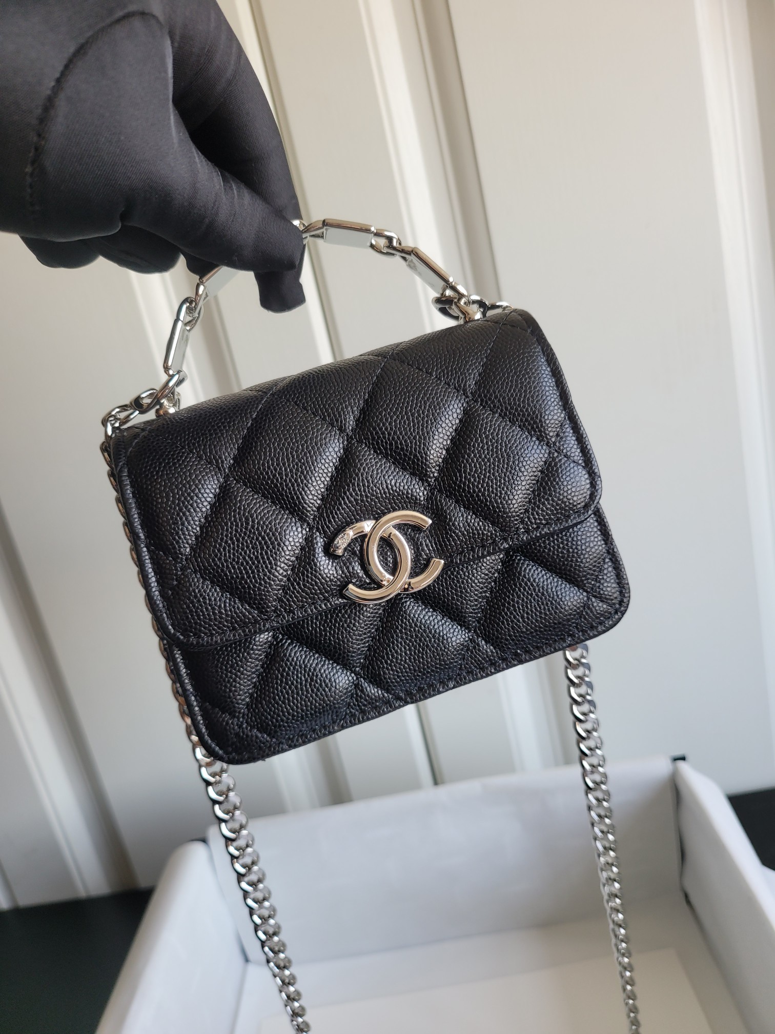 22S Mini Classic Flap Bag with Top Handle in Black Quilted Caviar Leather with Silver-Tone Hardware - Mocuir