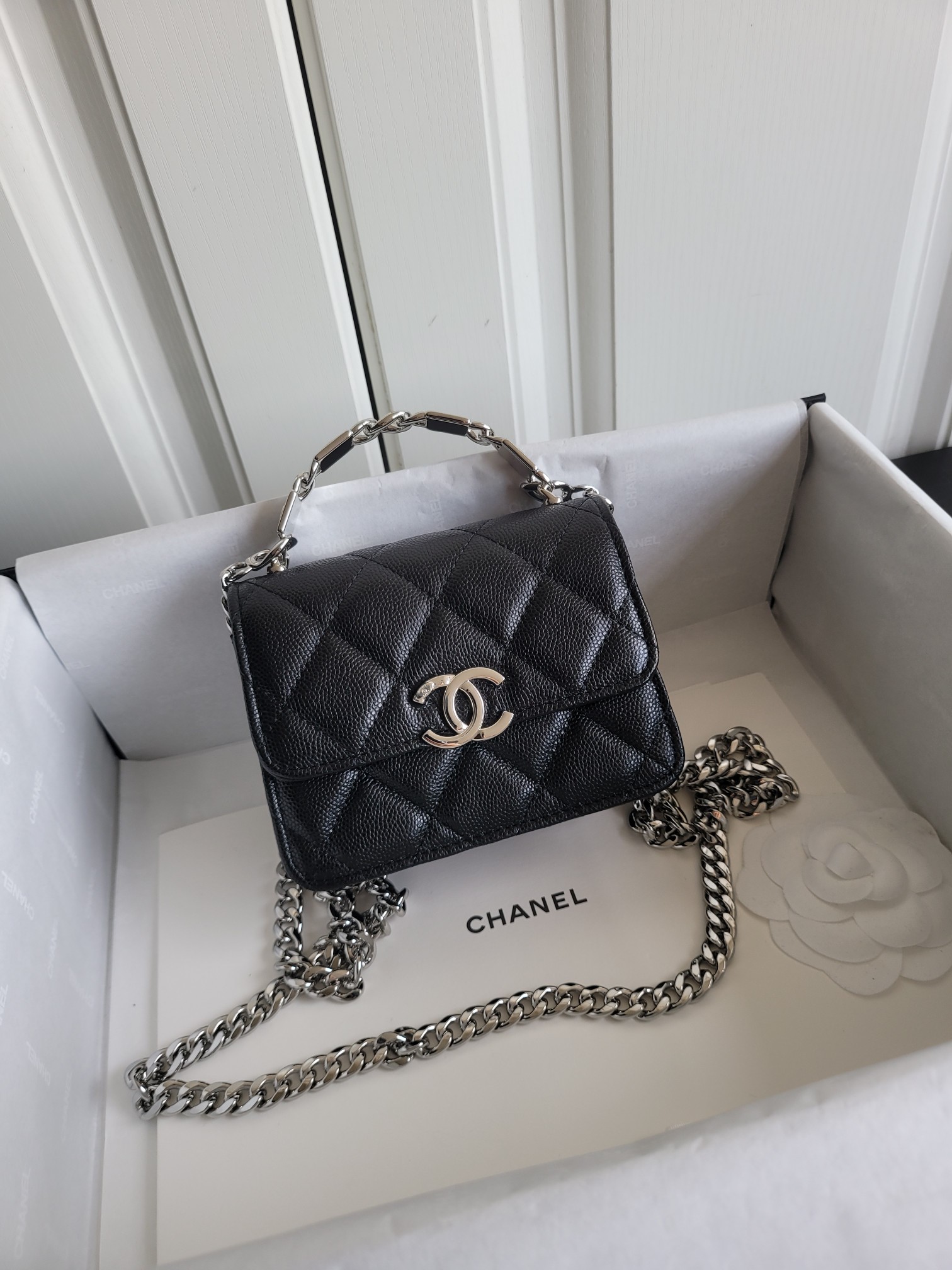 22S Mini Classic Flap Bag with Top Handle in Black Quilted Caviar Leather with Silver-Tone Hardware - Mocuir