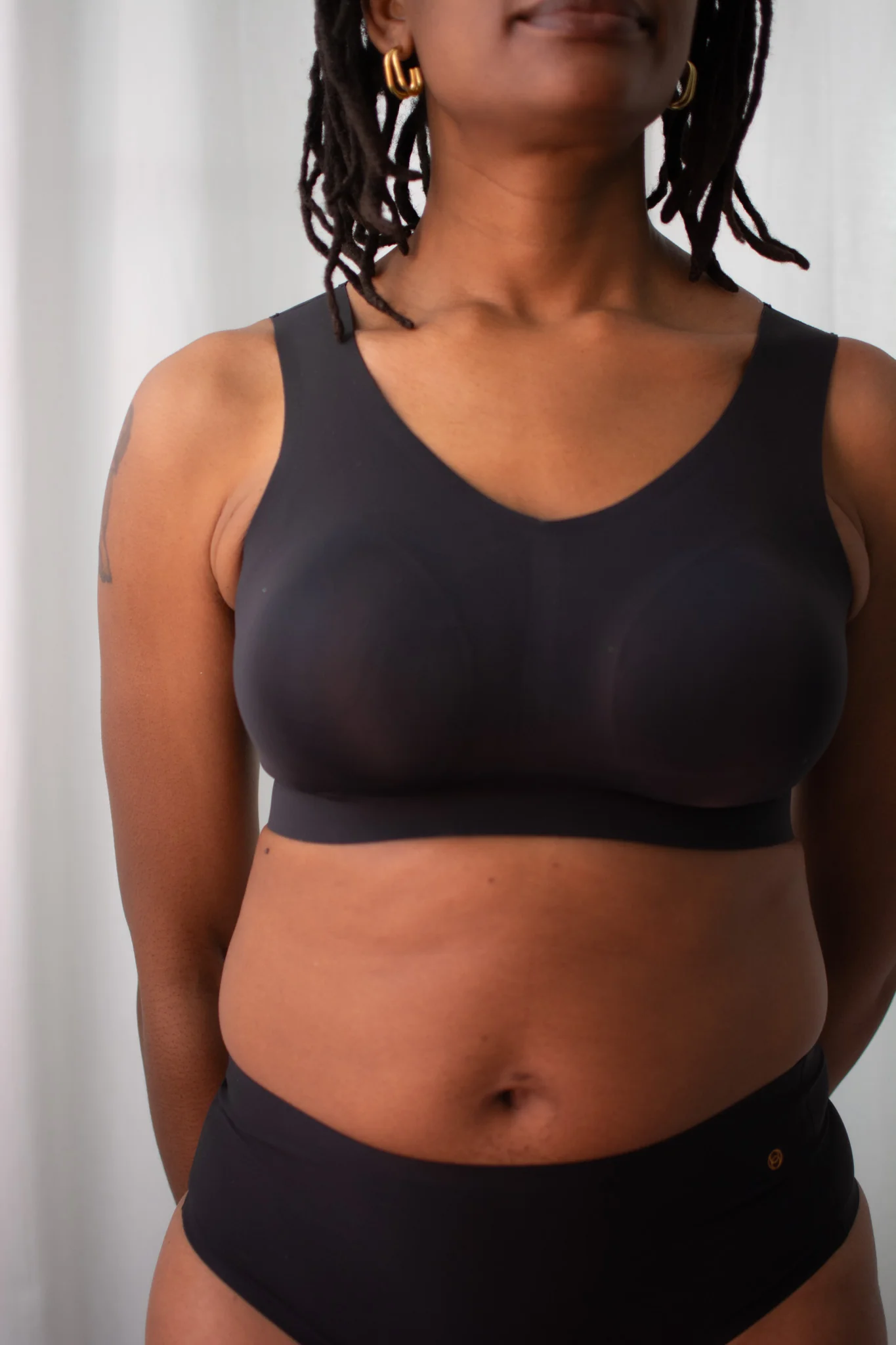 Evelyn and Bobbie Defy Bra