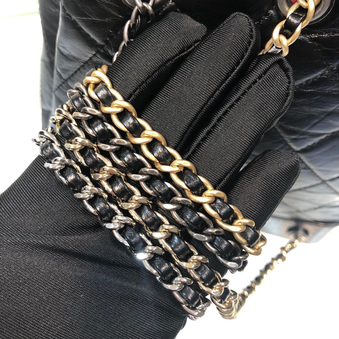 Gabrielle Small Quilted Aged Calfskin Backpack in Black - Mocuir