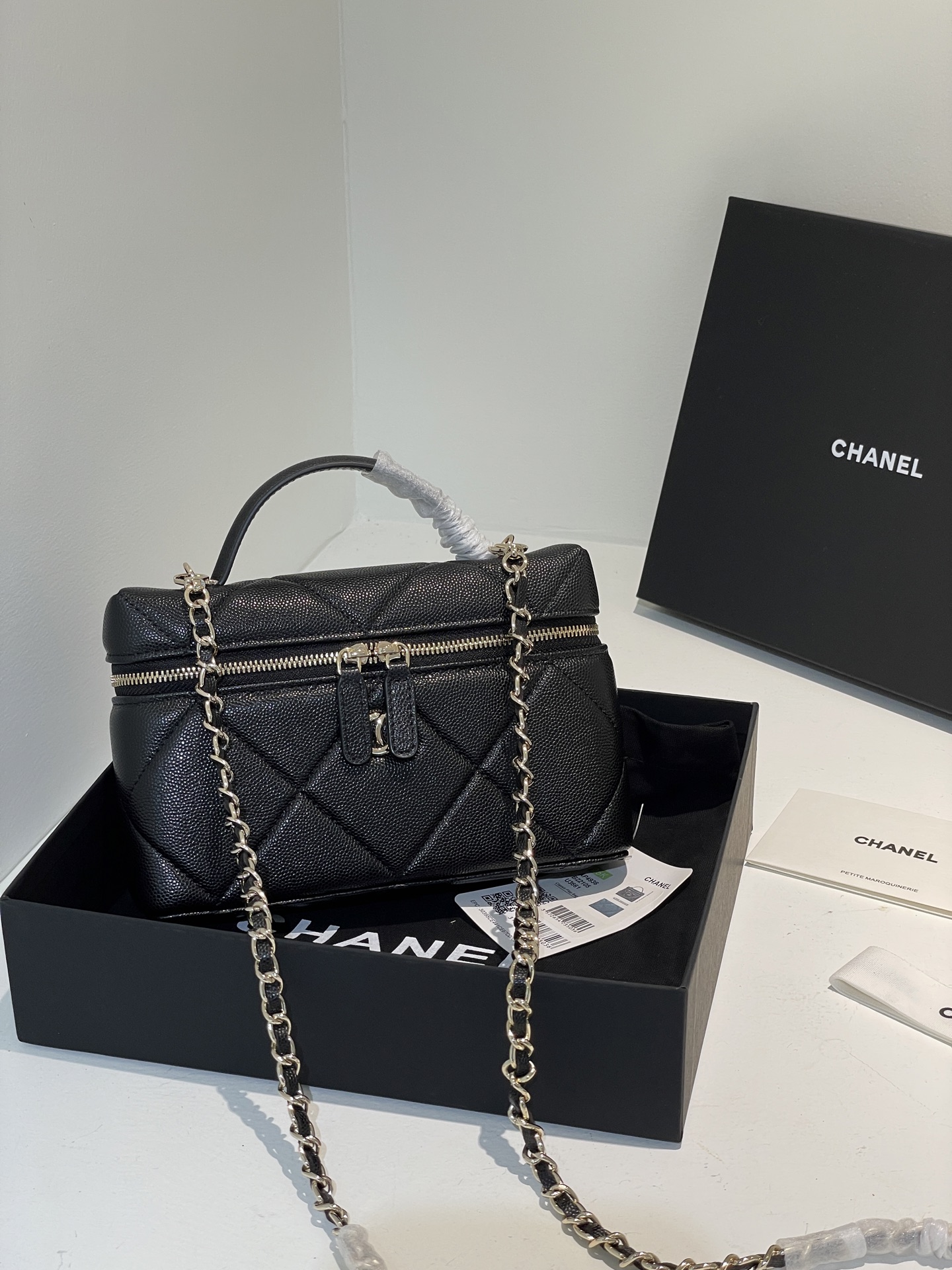 Black Quilted Caviar Calfskin Vanity Case with Top Handle and Gold-Tone Chain Strap - Mocuir