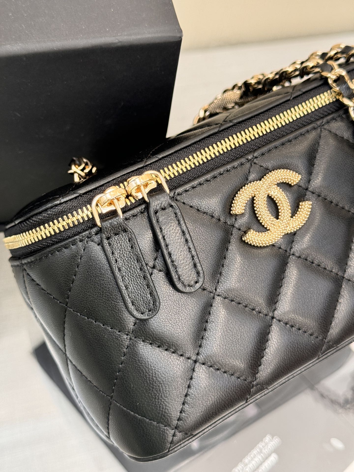 Long Vanity Case with Chain in Black Quilted Calfskin with Crystal CC Logo & Light Gold-Tone Hardware - Mocuir