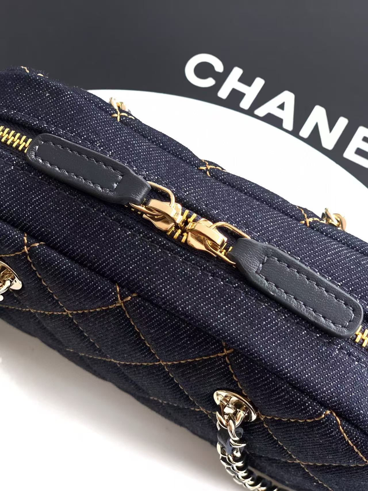 Quilted Denim Shell Clutch with Chain in Dark Blue Denim with Gold-Tone Hardware, 25S Spring-Summer Collection - Mocuir