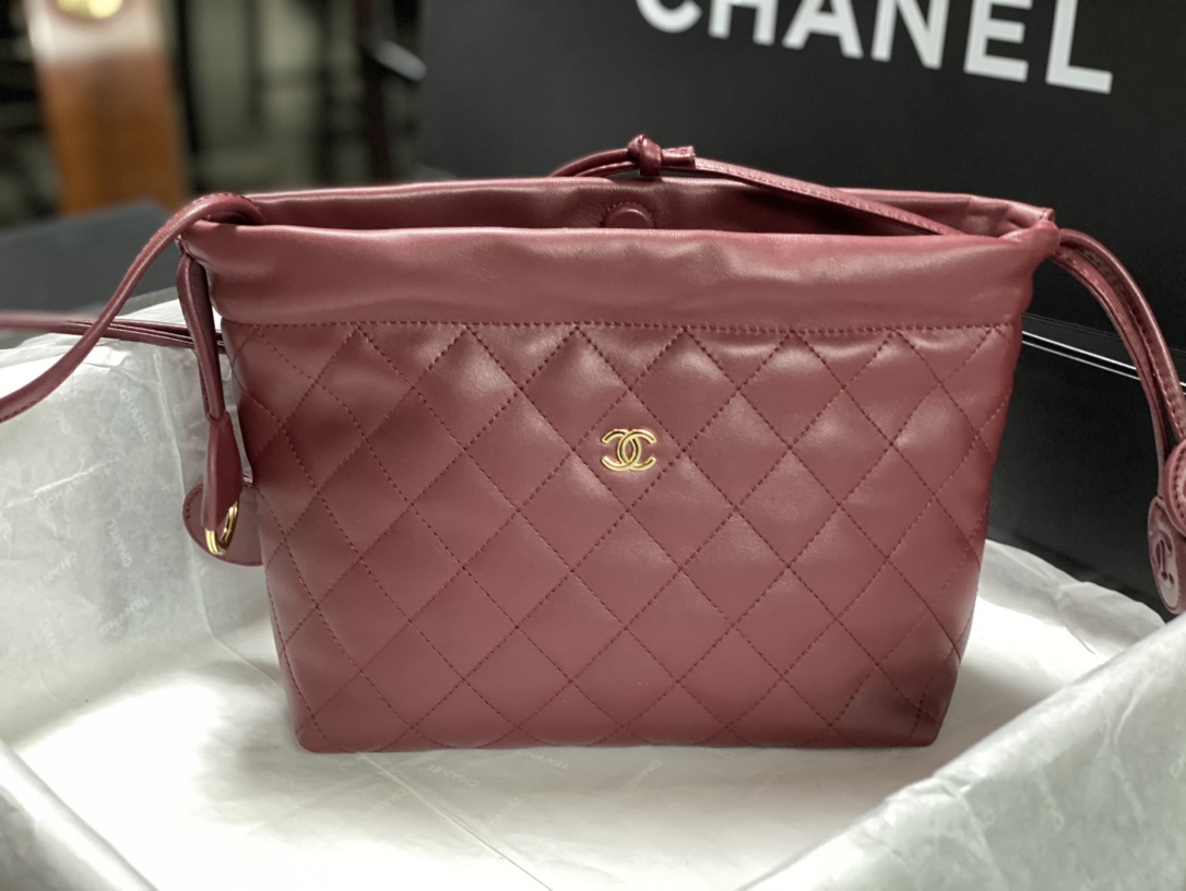 26C Dusty Rose Quilted Lambskin Drawstring Bucket Bag with Gold Hardware - Mocuir