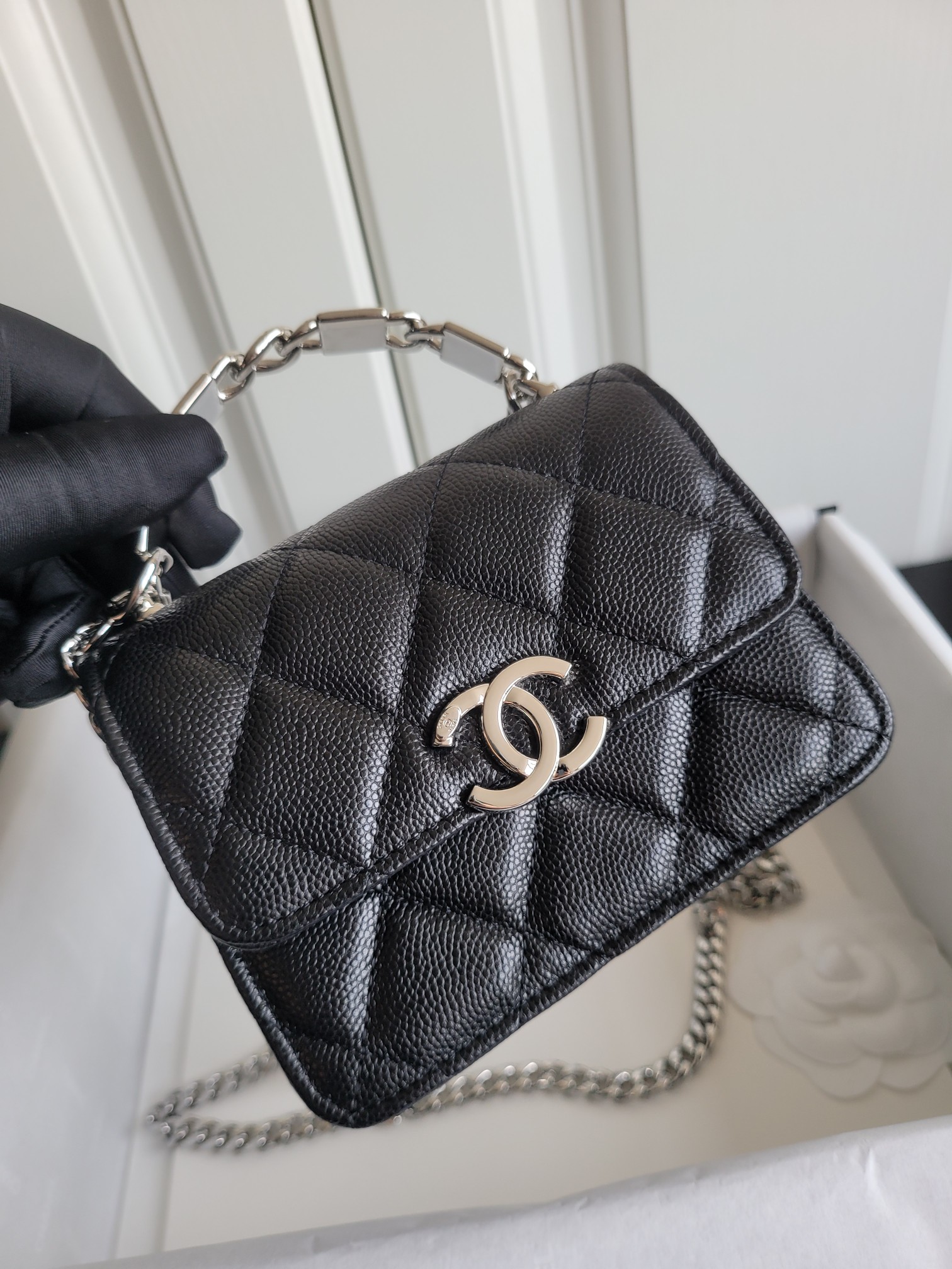 22S Mini Classic Flap Bag with Top Handle in Black Quilted Caviar Leather with Silver-Tone Hardware - Mocuir