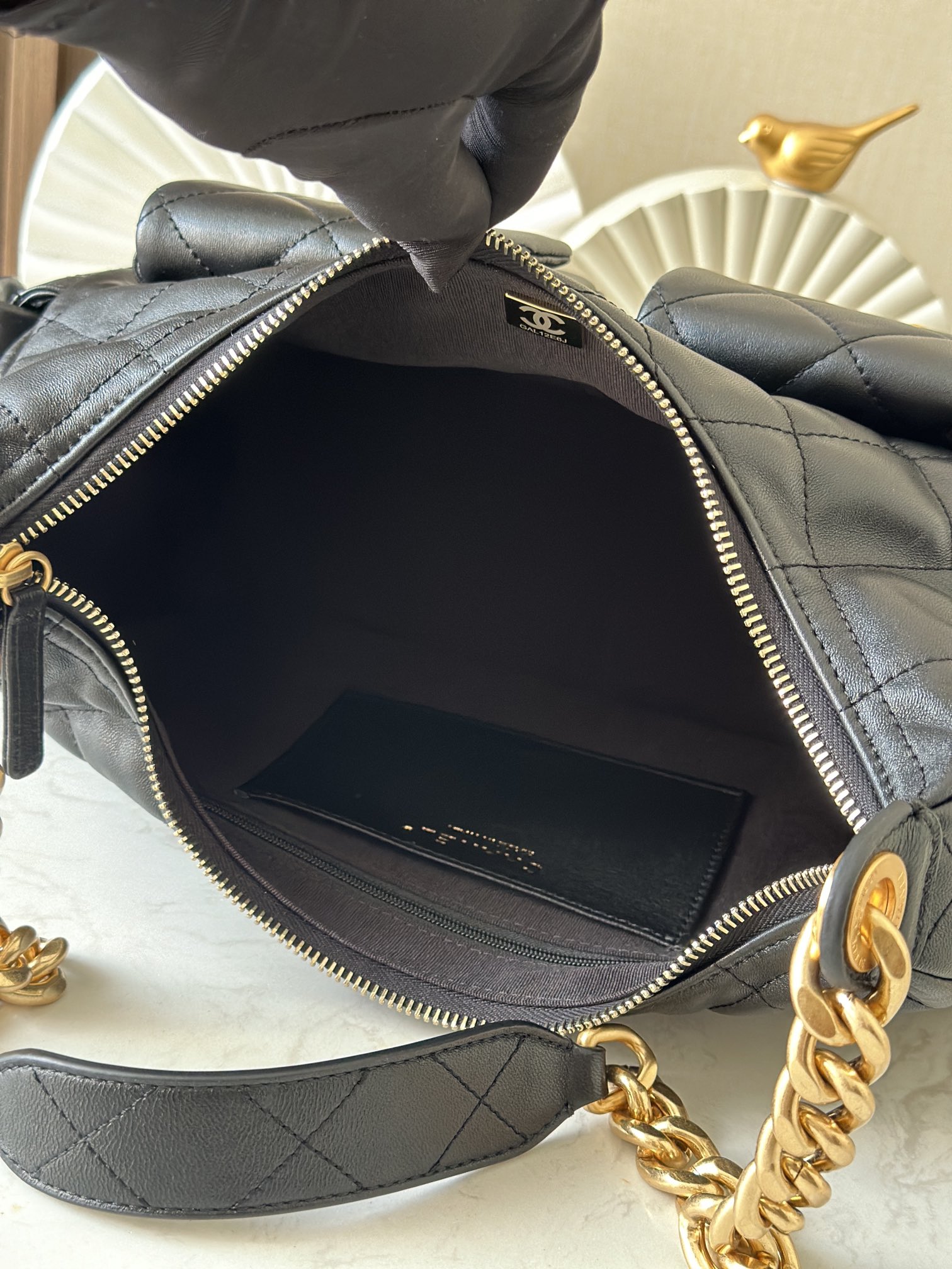 Black Quilted Lambskin Multi-Pocket Hobo Bag with Gold Hardware - Mocuir