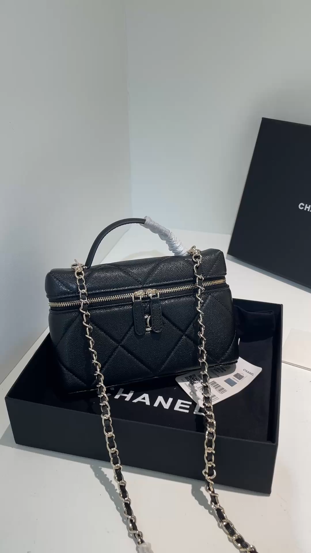 Black Quilted Caviar Calfskin Vanity Case with Top Handle and Gold-Tone Chain Strap - Mocuir