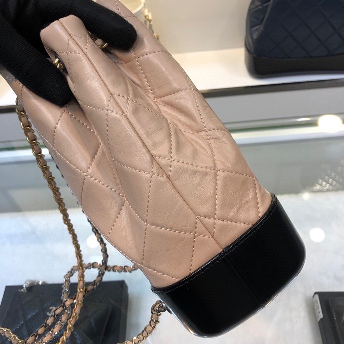 Gabrielle Small Quilted Aged Calfskin Backpack in Beige & Black - Mocuir