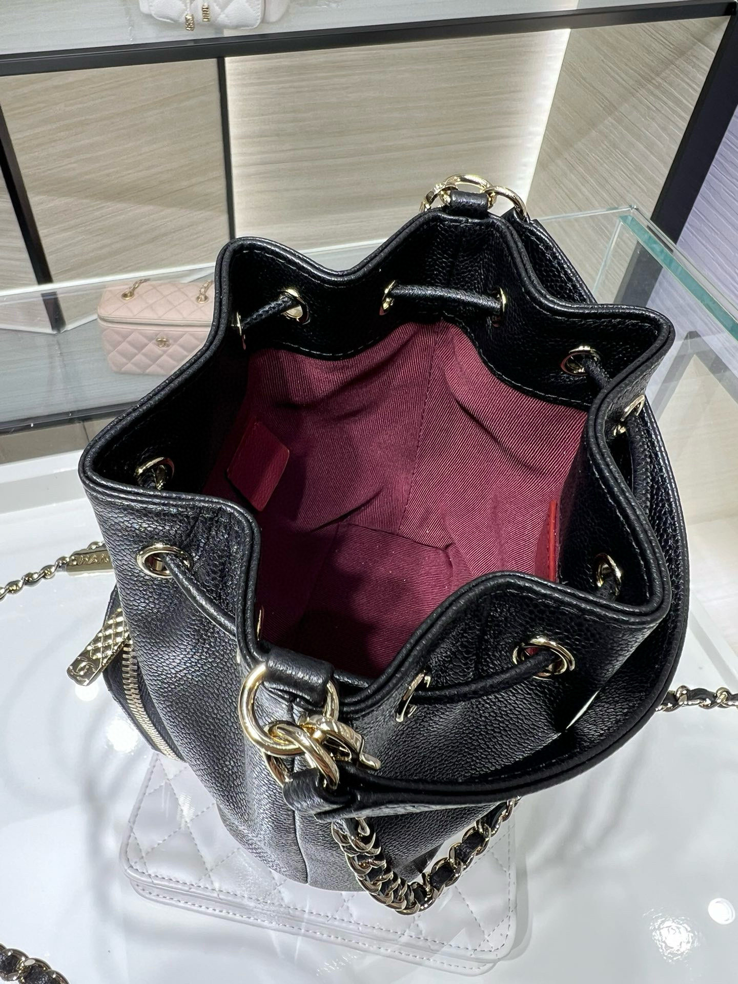 Small Drawstring Bucket Bag in Black Quilted Grained Calfskin with Gold-Tone Metal (Model AP4775) - Mocuir