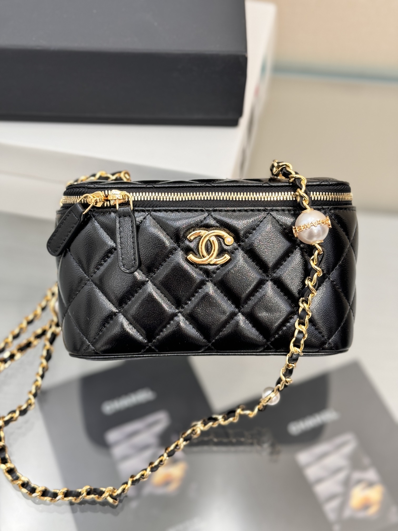 Long Vanity Case with Chain & Pearl Detail in Black Quilted Lambskin with Light Gold-Tone Hardware - Mocuir