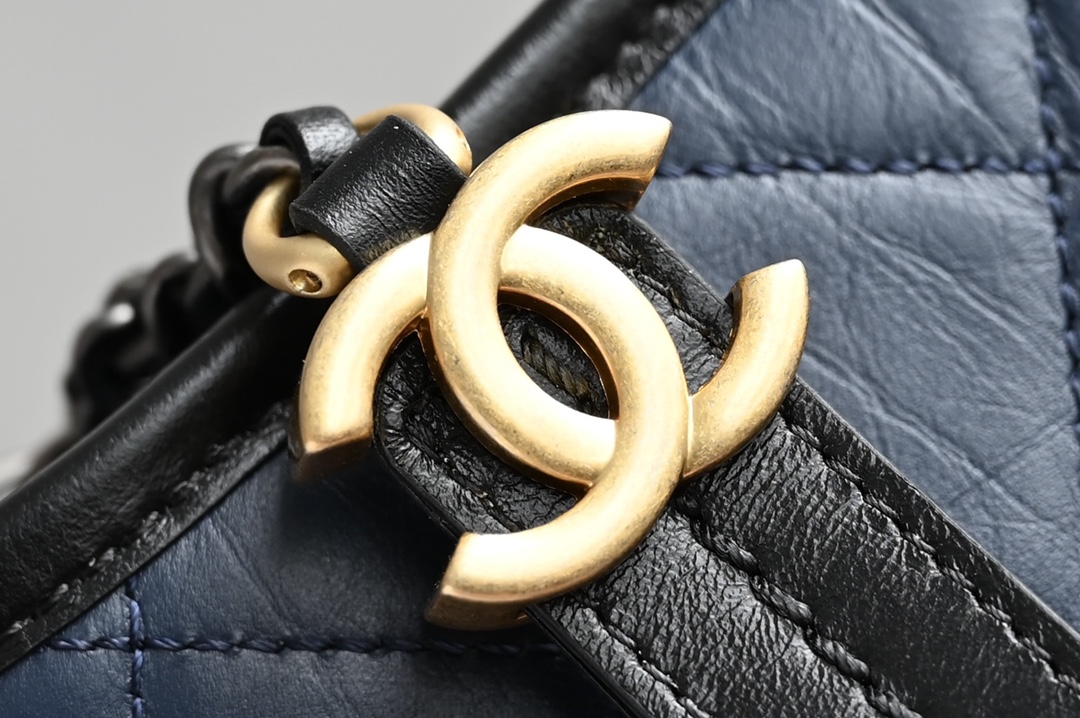 Small Gabrielle Hobo Bag in Navy Blue and Black Quilted Aged Calfskin with Gold-Tone and Silver-Tone Metal (Model A91810) - Mocuir