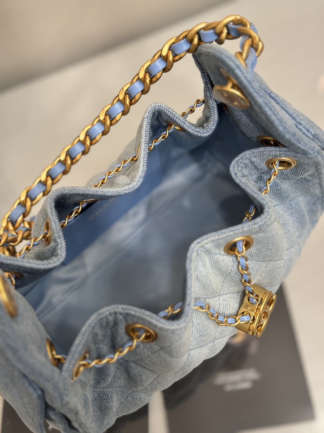 25 Small Hobo Bag (AS5293) in Light Blue Washed Denim & Antique Gold-Tone Hardware - Mocuir