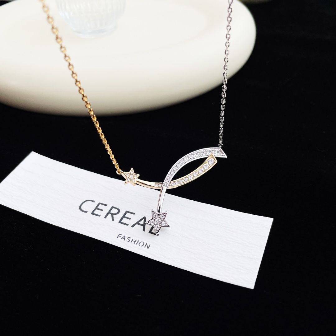 Two-tone comet necklace