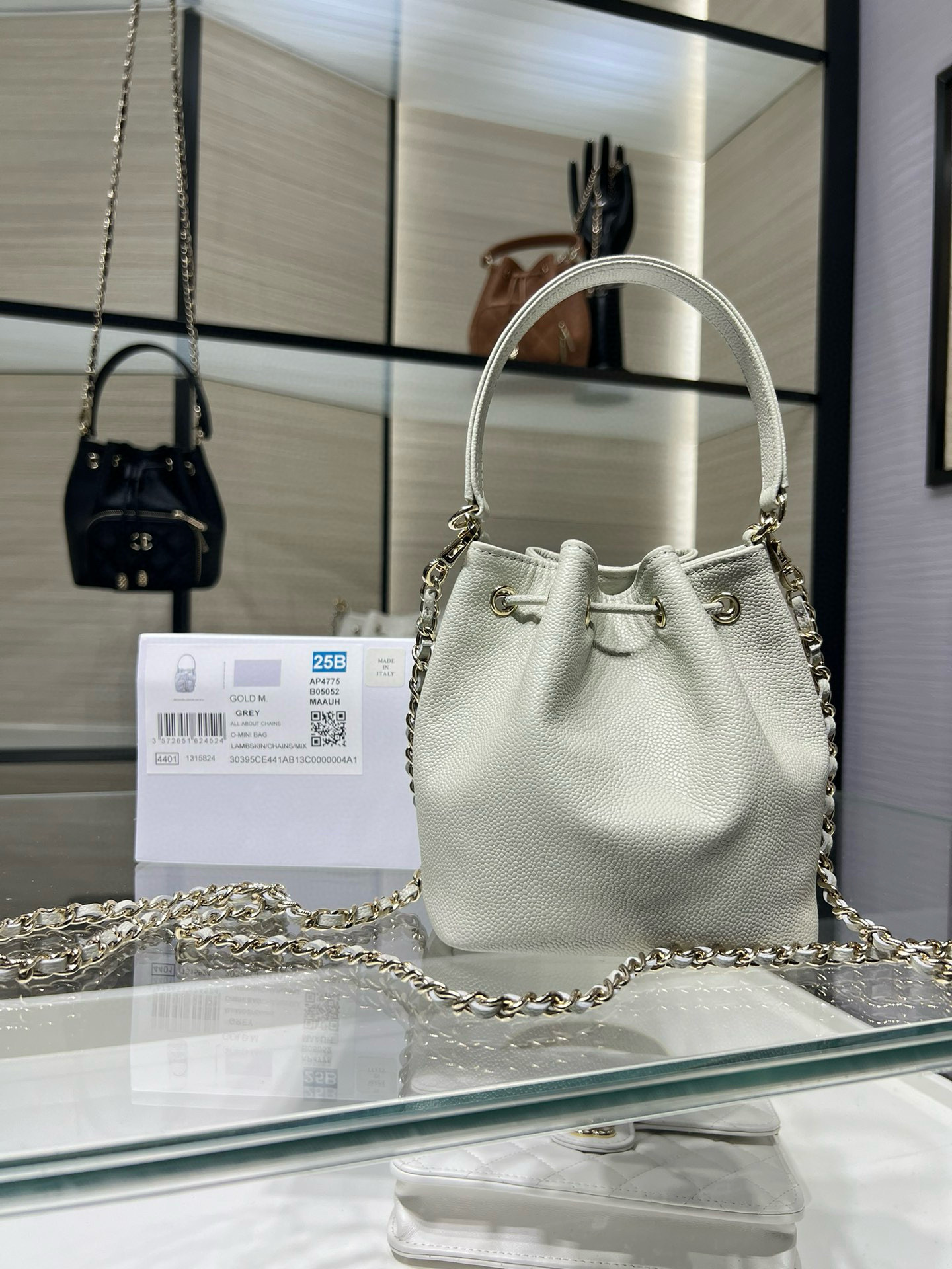 Small Drawstring Bucket Bag in Grey Quilted Grained Calfskin with Gold-Tone Metal (Model AP4775) - Mocuir