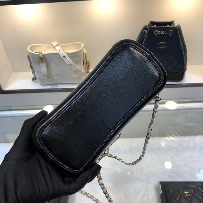 Gabrielle Small Quilted Aged Calfskin Backpack in White & Black - Mocuir