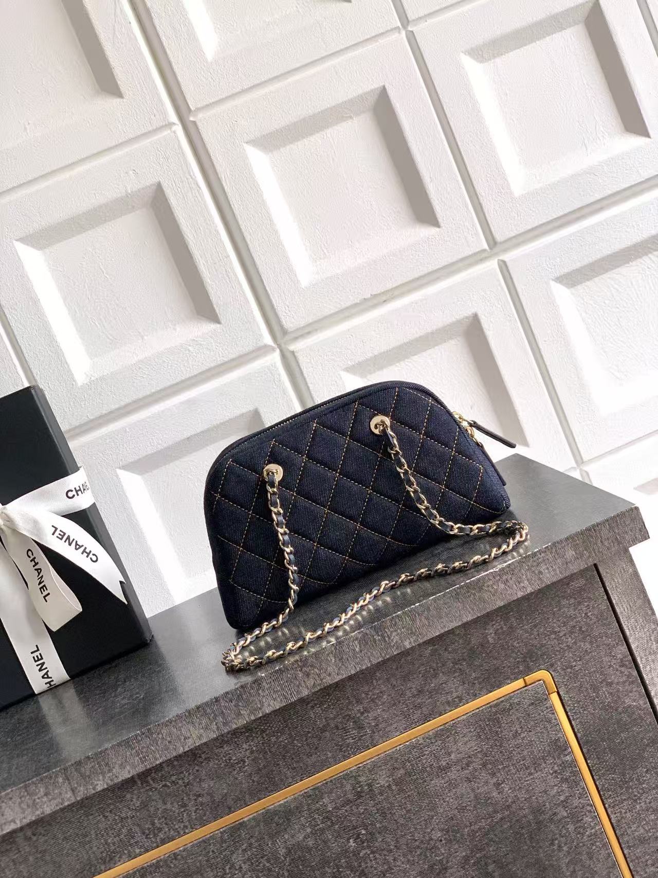 Quilted Denim Shell Clutch with Chain in Dark Blue Denim with Gold-Tone Hardware, 25S Spring-Summer Collection - Mocuir