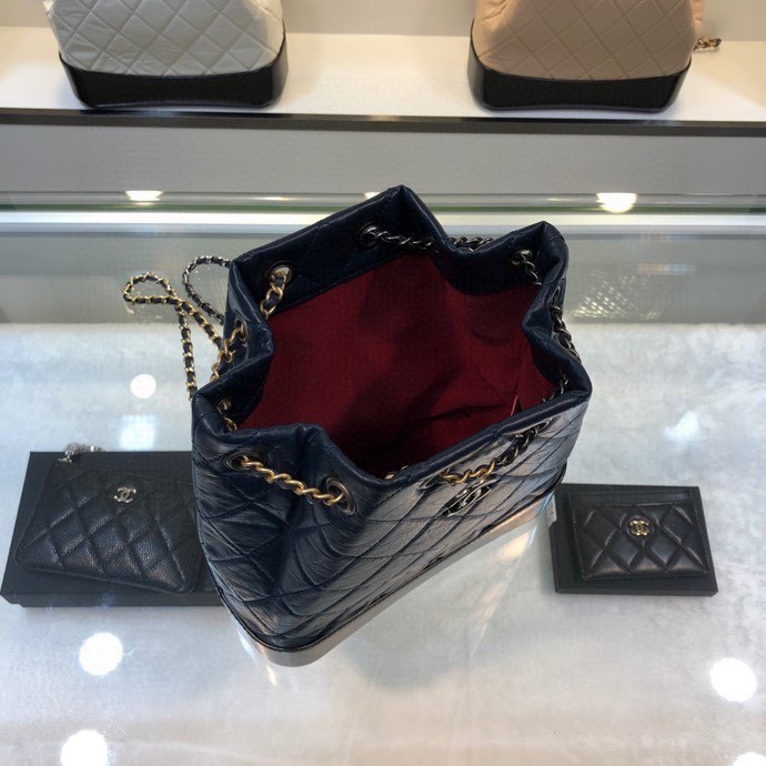 Gabrielle Small Quilted Aged Calfskin Backpack in Navy Blue & Black - Mocuir