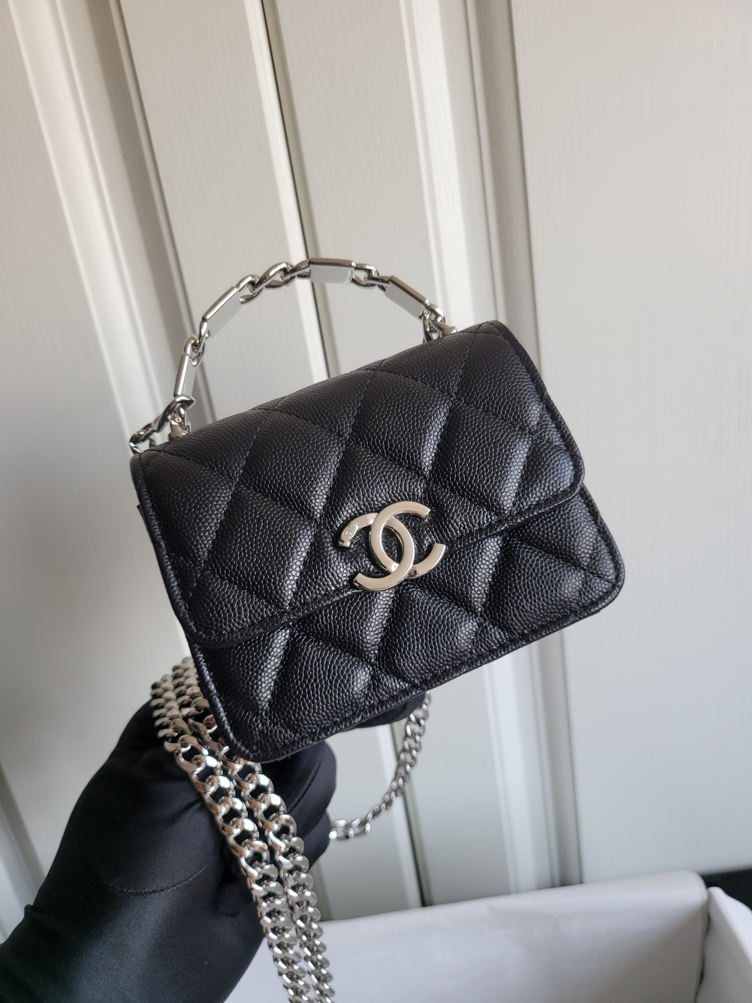 22S Mini Classic Flap Bag with Top Handle in Black Quilted Caviar Leather with Silver-Tone Hardware - Mocuir