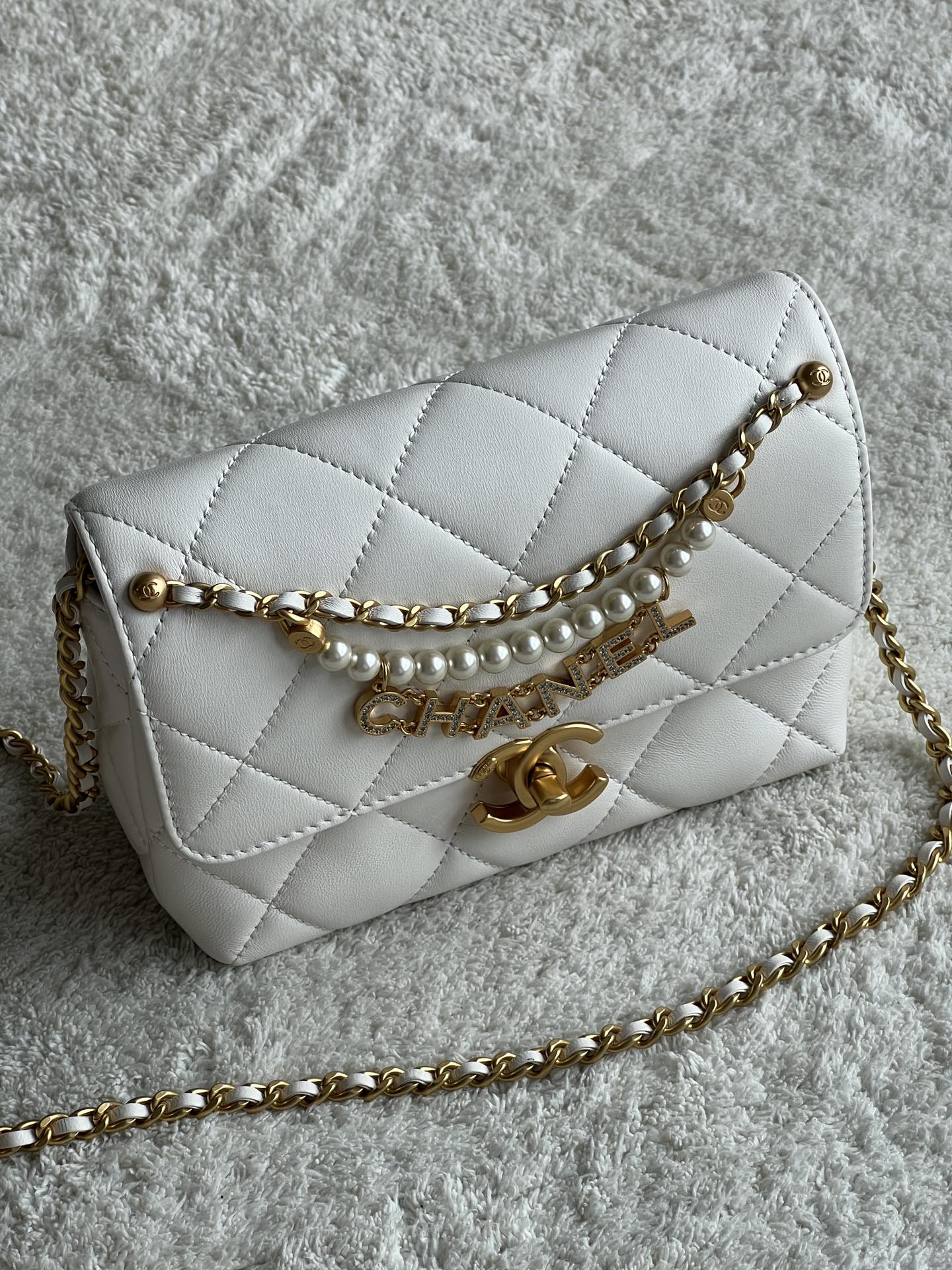 24A Mini Classic Flap Bag in White Quilted Lambskin with Pearl & Crystal CHANEL Letter Chain and Light Gold-Tone Hardware (AS4997) - Mocuir