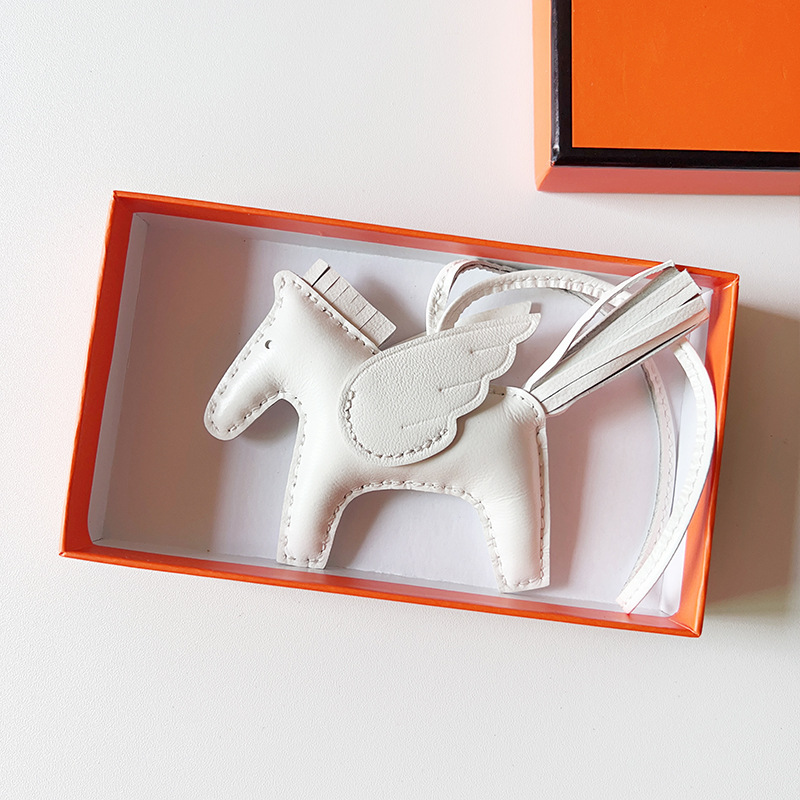 H Hand sewn pony pendant
