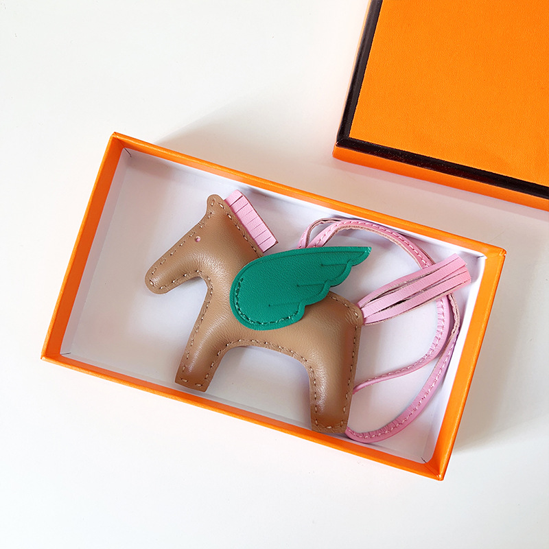 H Hand sewn pony pendant