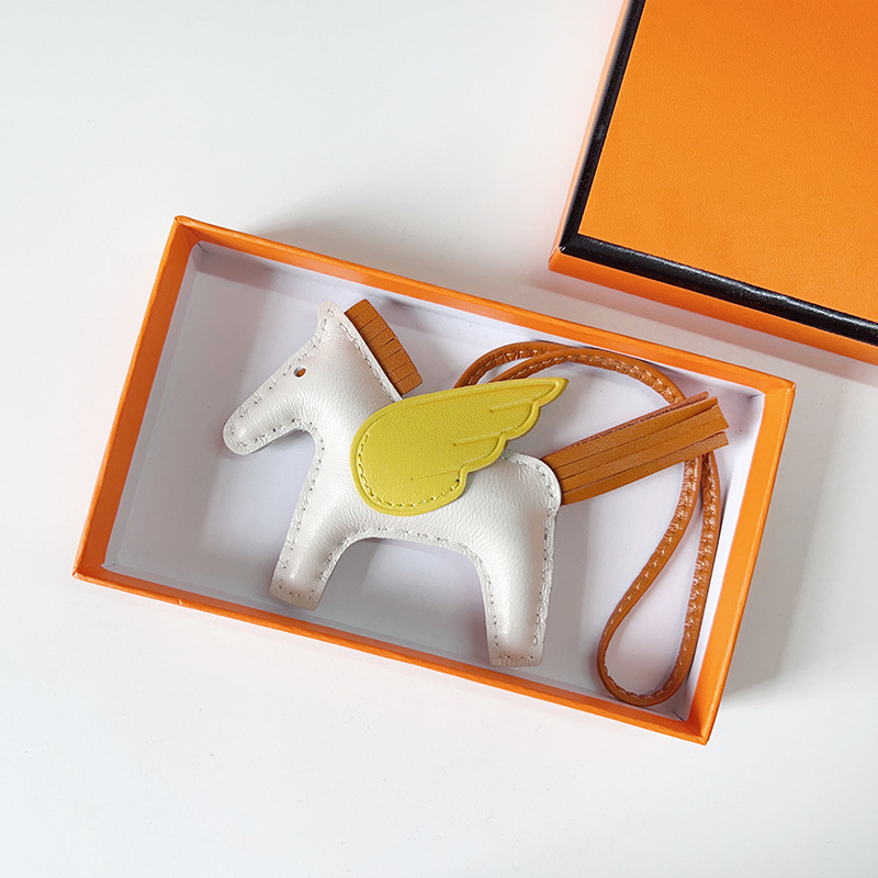 H Hand sewn pony pendant