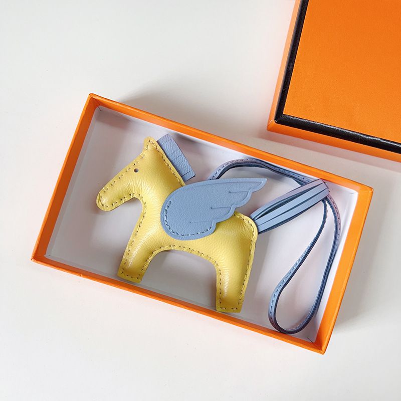 H Hand sewn pony pendant