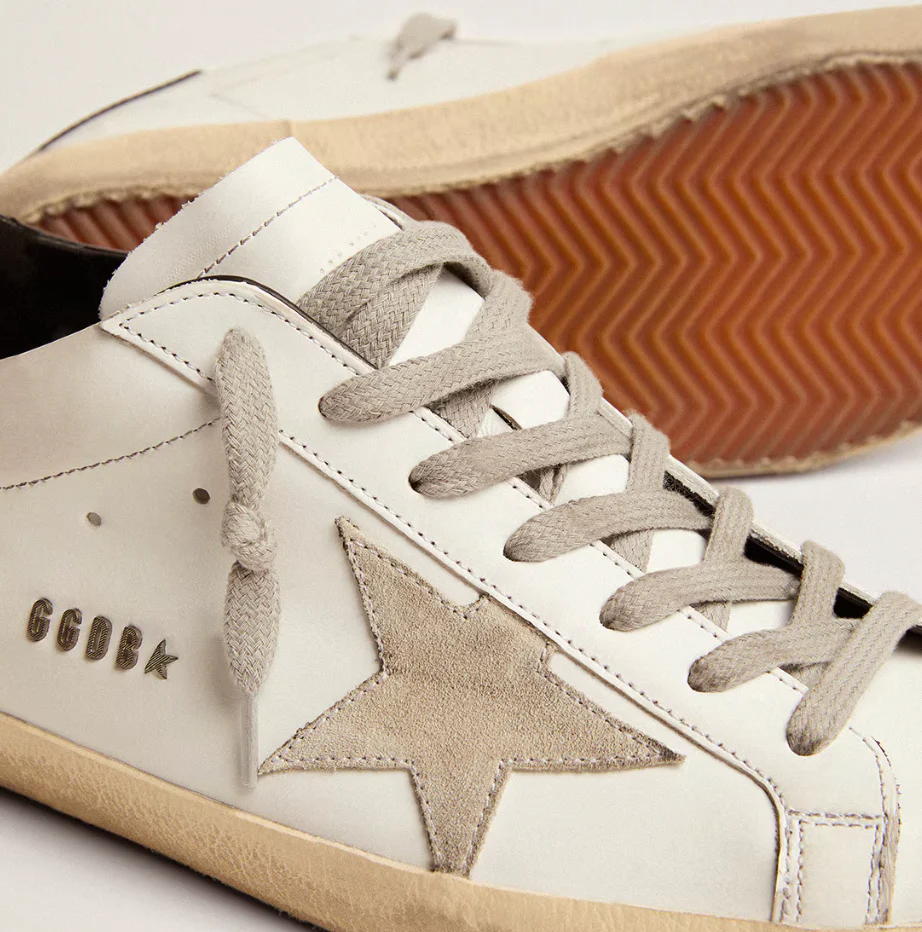 Super-Star with black reinforcement and metallic studs lettering