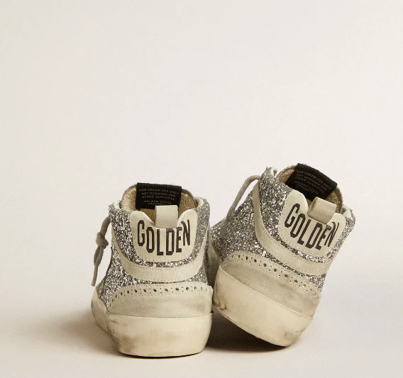 Mid Star in silver glitter with a star and comma in glace suede