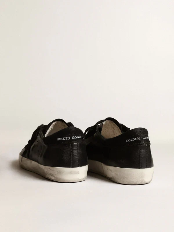 Super-Star in black nappa leather with a suede black star and heel tab