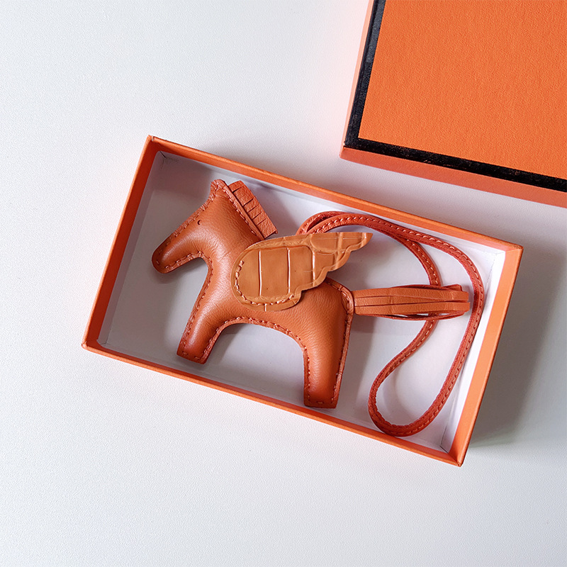 H Hand sewn pony pendant