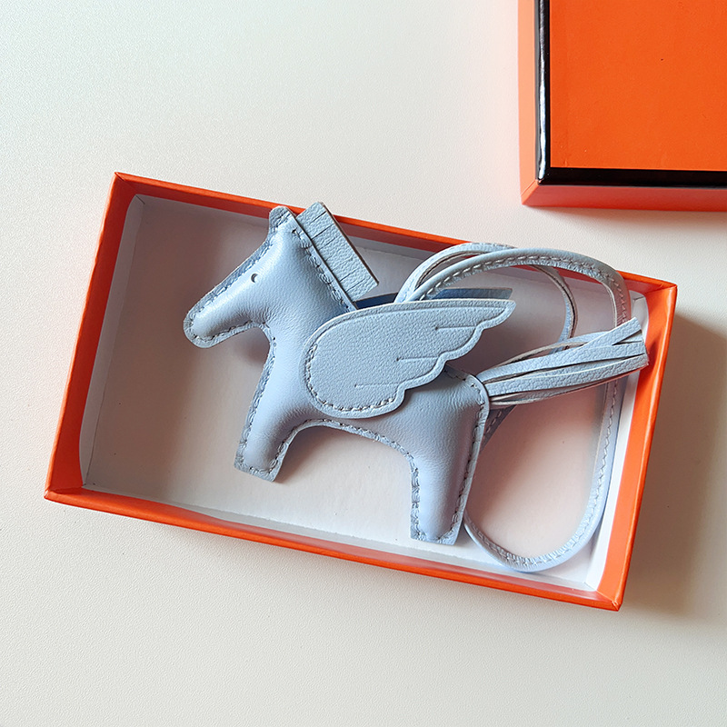 H Hand sewn pony pendant