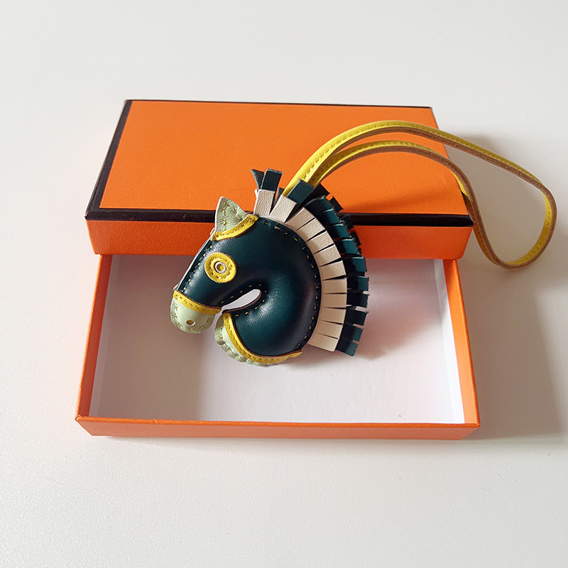 Handsewn unicorn pendant