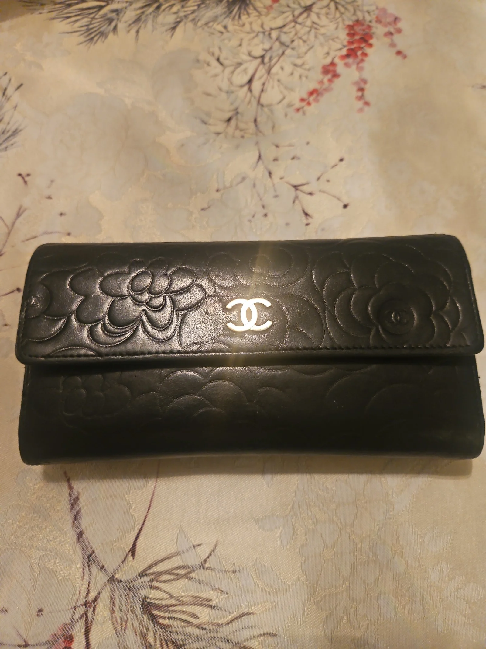 CHANEL Black Lambskin Camellia Embossed Wallet