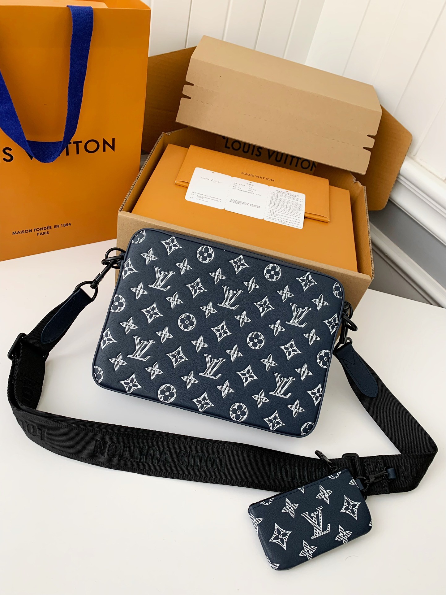 Louis Vuitton The new TRlO Postman Pack M24753