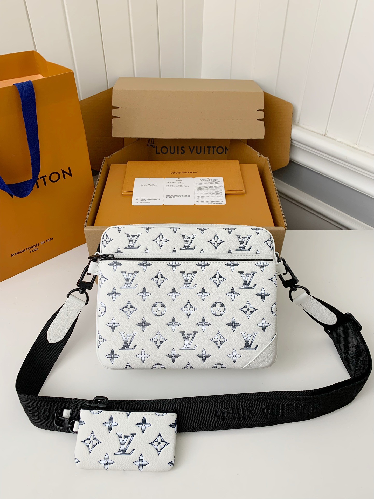 Louis Vuitton The new TRlO Postman Pack M24753