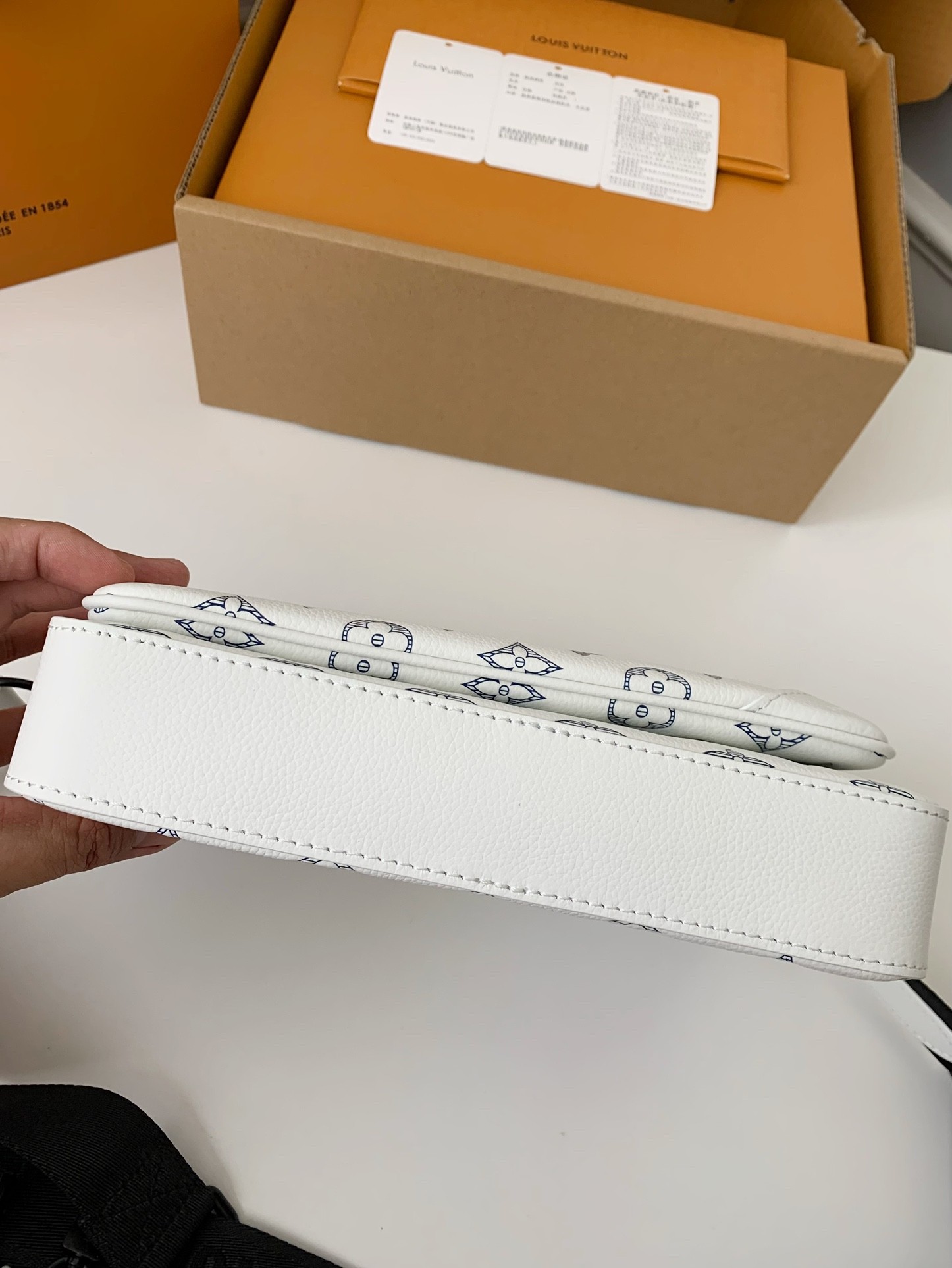 Louis Vuitton The new TRlO Postman Pack M24753