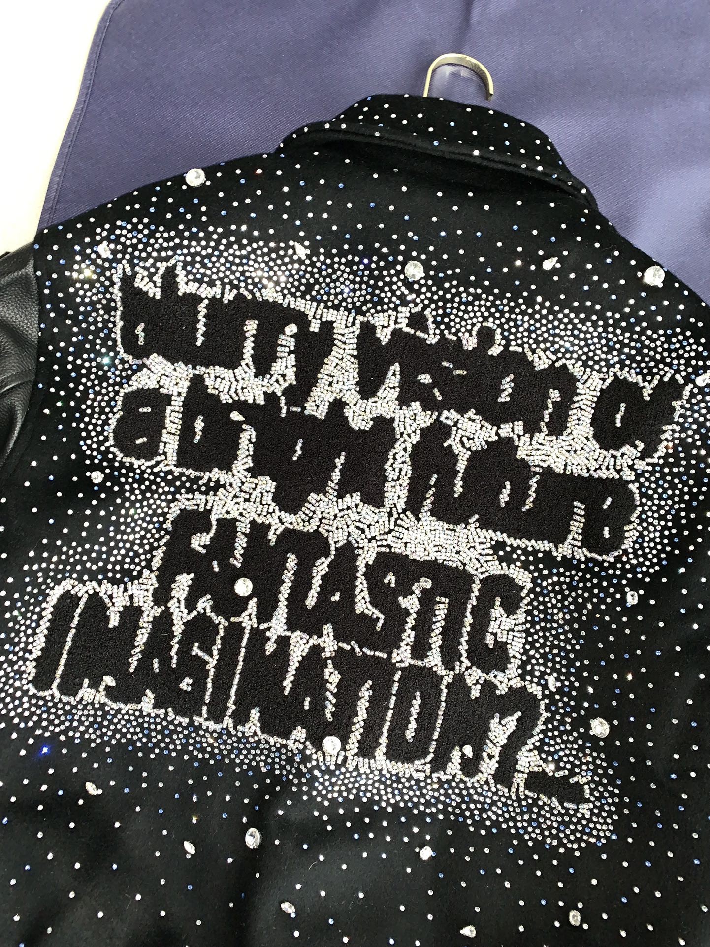 Louis Vuitton FW23 lettered beaded embroidered leather jacket