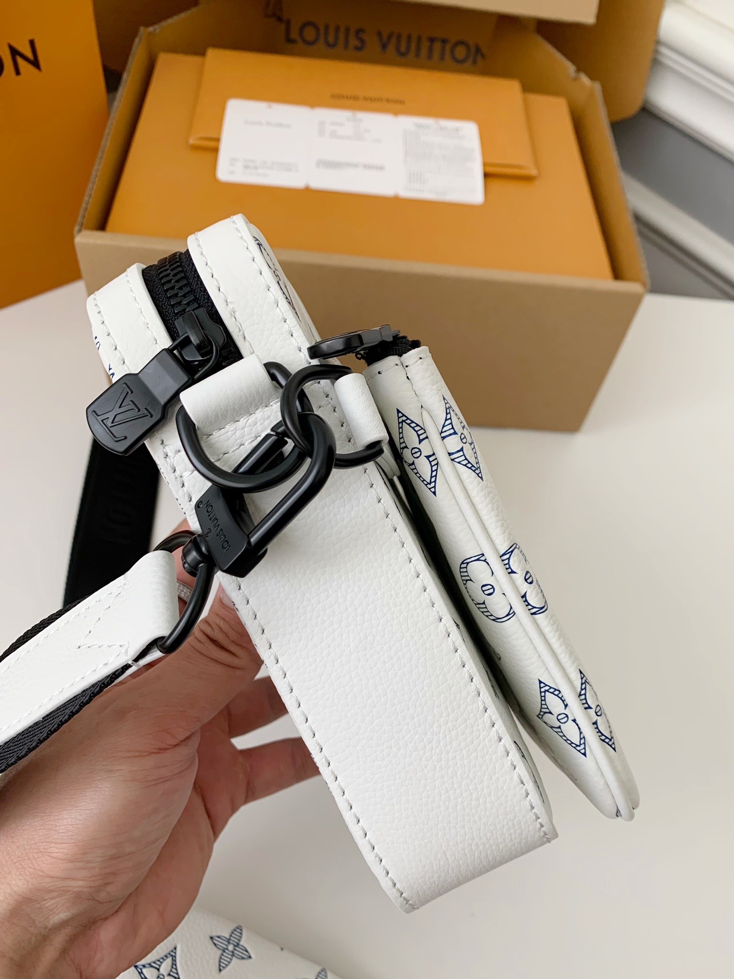 Louis Vuitton The new TRlO Postman Pack M24753