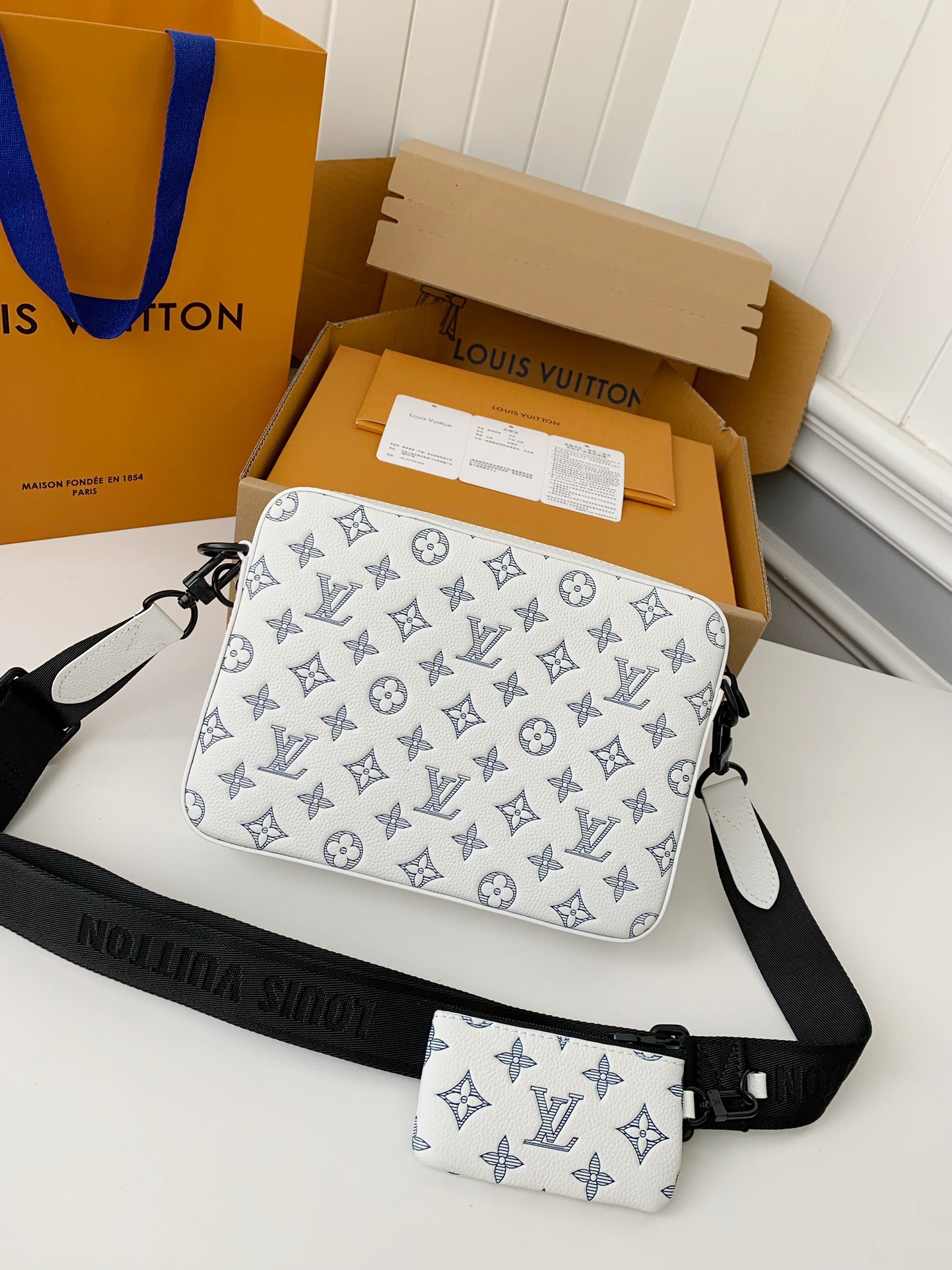 Louis Vuitton The new TRlO Postman Pack M24753