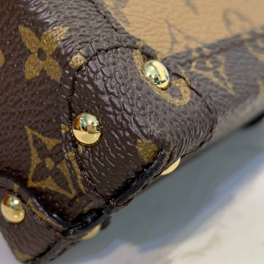 Louis Vuitton Vertical Trunk Pochette M67873