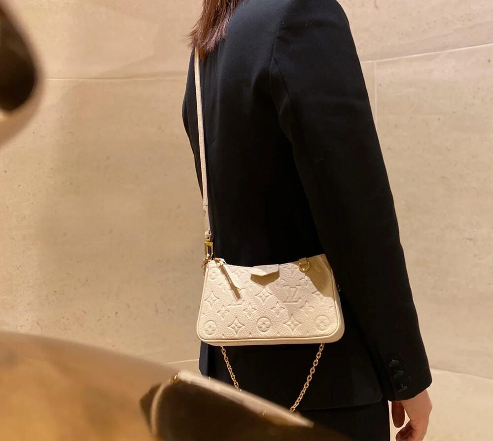 Louis Vuitton Monogram Empreinte Easy Pouch On Strap M81066 Creme