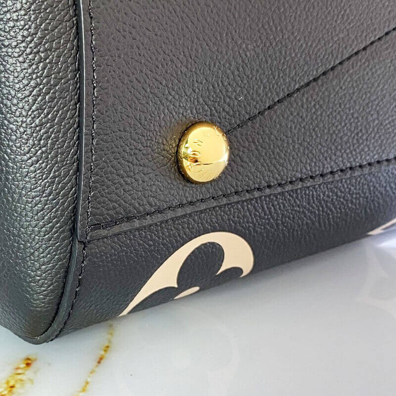 Louis Vuitton Monogram Empreinte Leather Montaigne MM M45499