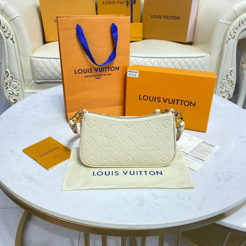 Louis Vuitton Monogram Empreinte Easy Pouch On Strap M81066 Creme
