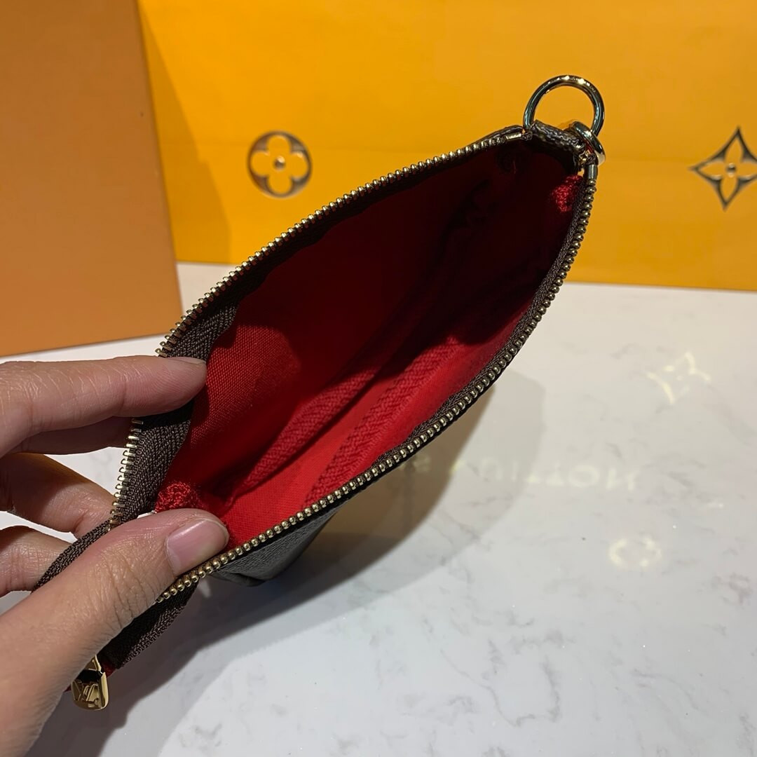 Louis Vuitton Vivienne Mini Pochette Accessoires M69056