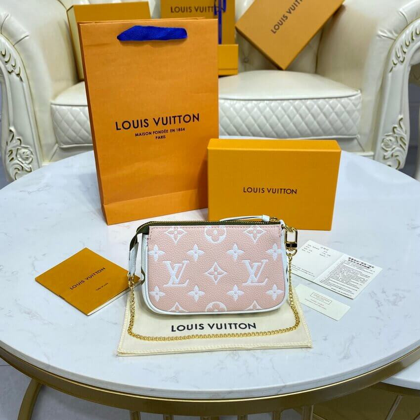 Louis Vuitton Monogram Empreinte Leather Mini Pochette Accessoires M81284