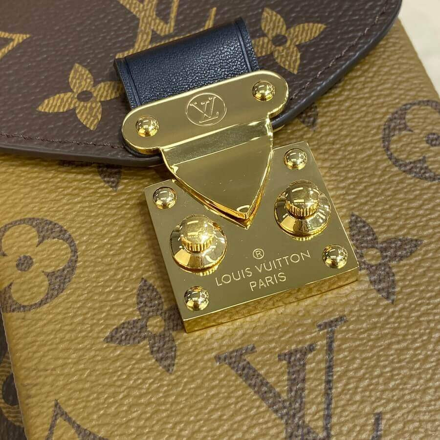 Louis Vuitton Vertical Zippy Wallet Metis M80731